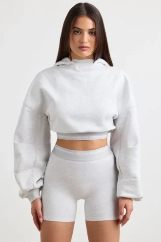 Kort hoodie i stretchig bomullsfleece i gråmelerat