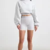 Kort hoodie i stretchig bomullsfleece i gråmelerat
