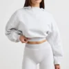 Kort hoodie i stretchig bomullsfleece i gråmelerat