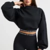 Kort hoodie i stretchig bomullsfleece i svart