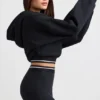 Kort hoodie i stretchig bomullsfleece i svart