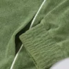 Kort sweatshirt i frotté med dragkedja i grönt