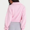 Kort sweatshirt i ribbad stickning med dragkedja i ljusrosa