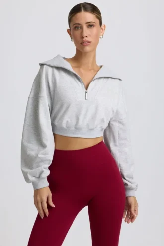 Kort sweatshirt med kvartslång dragkedja i gråmelerat