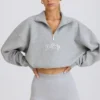 Kort sweatshirt med kvartslång dragkedja i gråmelerat