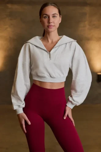 Kort sweatshirt med kvartslång dragkedja i gråmelerat