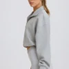 Kort sweatshirt med kvartslång dragkedja i gråmelerat