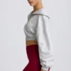 Kort sweatshirt med kvartslång dragkedja i gråmelerat