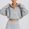 Kort sweatshirt med kvartslång dragkedja i gråmelerat
