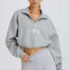 Kort sweatshirt med kvartslång dragkedja i gråmelerat