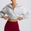 Kort sweatshirt med kvartslång dragkedja i gråmelerat