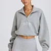 Kort sweatshirt med kvartslång dragkedja i gråmelerat