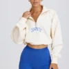 Kort sweatshirt med kvartslås i vitt
