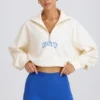 Kort sweatshirt med kvartslås i vitt