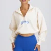 Kort sweatshirt med kvartslås i vitt
