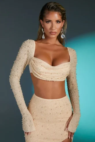 La Desirade Embellished Cowl Neck Crop Top i sand