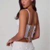 Letitia Embellished Lace-Up Corset Top i vitt