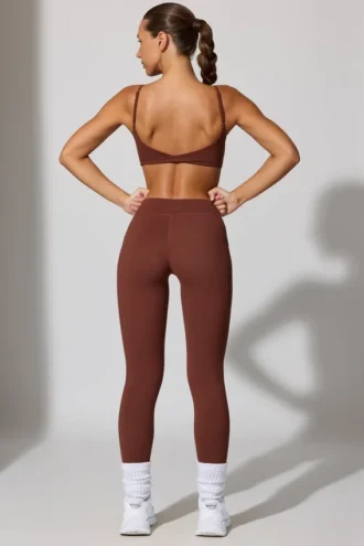 Långa leggings med fickor i brunt
