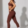Långa leggings med fickor i brunt