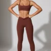 Långa leggings med fickor i brunt