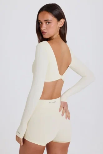 Långärmad crop top i kräm