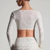 Lumina Embellished Long-Sleeve Crop Top i vitt