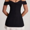 Maelie Off-Shoulder Ruffle A-Line Miniklänning i svart