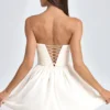 Mirabelle bandeau-miniklänning med blomapplikationer i elfenben