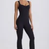Mjuk Active-jumpsuit med utskärning i ryggen i svart