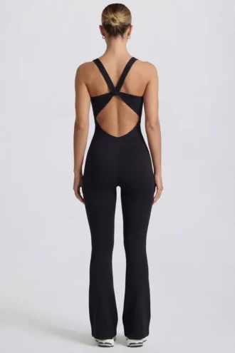Mjuk Active-jumpsuit med utskärning i ryggen i svart