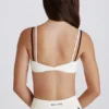 Mjuk Active-sport-BH med vridet ryggparti i lager-på-lager-stil i elfenben