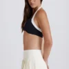 Mjuk, aktiv tennis-skort med plissering och låg midja i färgen Ivory