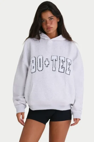 Mjuk bomullsjersey-hoodie i oversized-modell i gråmelerad