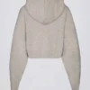 Mjuk stickad kort hoodie med dragkedja i beige