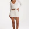 Mjuk stickad minikjol i ivory