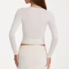 Mjuk stickad minikjol i ivory