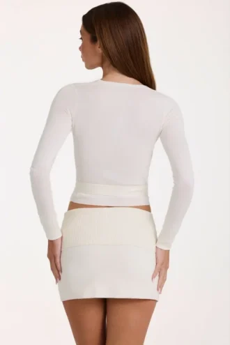 Mjuk stickad wrap-top i ivory