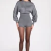 Moya långärmad jumpsuit i finstickat grått