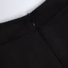 Musa långärmad jumpsuit med hög hals i svart
