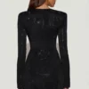 Nevina Asymmetrisk bodycon-miniklänning med dekorationer i svart