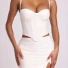 Cassandra vinylkorsett-crop-top med bygel i vitt