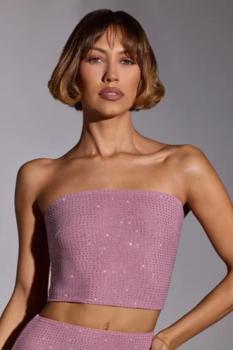 Odetta, utsmyckad, axelbandslös crop top i ljusrosa