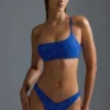Oh Polly Badkläder: HOTFIX Edition Bandeau-bikinitopp med en axel och dekorationer i kungsblått
