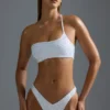 Oh Polly Badkläder: HOTFIX Edition Bandeau-bikinitopp med en axel och dekorationer i vitt