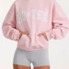 Oversized hoodie med applikation i färgen Blush