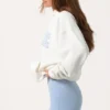 Oversized hoodie med applikation i färgen Milk