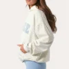 Oversized-hoodie med applikation i färgen Milk Polka Dot