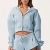 Oversized hoodie med dragkedja  i puderblått