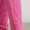 Oversized joggingbyxor i borstad jersey i hot pink
