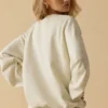 Oversized tröja med rund hals i benvit